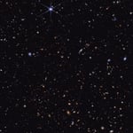 Webb Telescope Reveals Little Red Dots Are Black Holes in a Temporary Phase